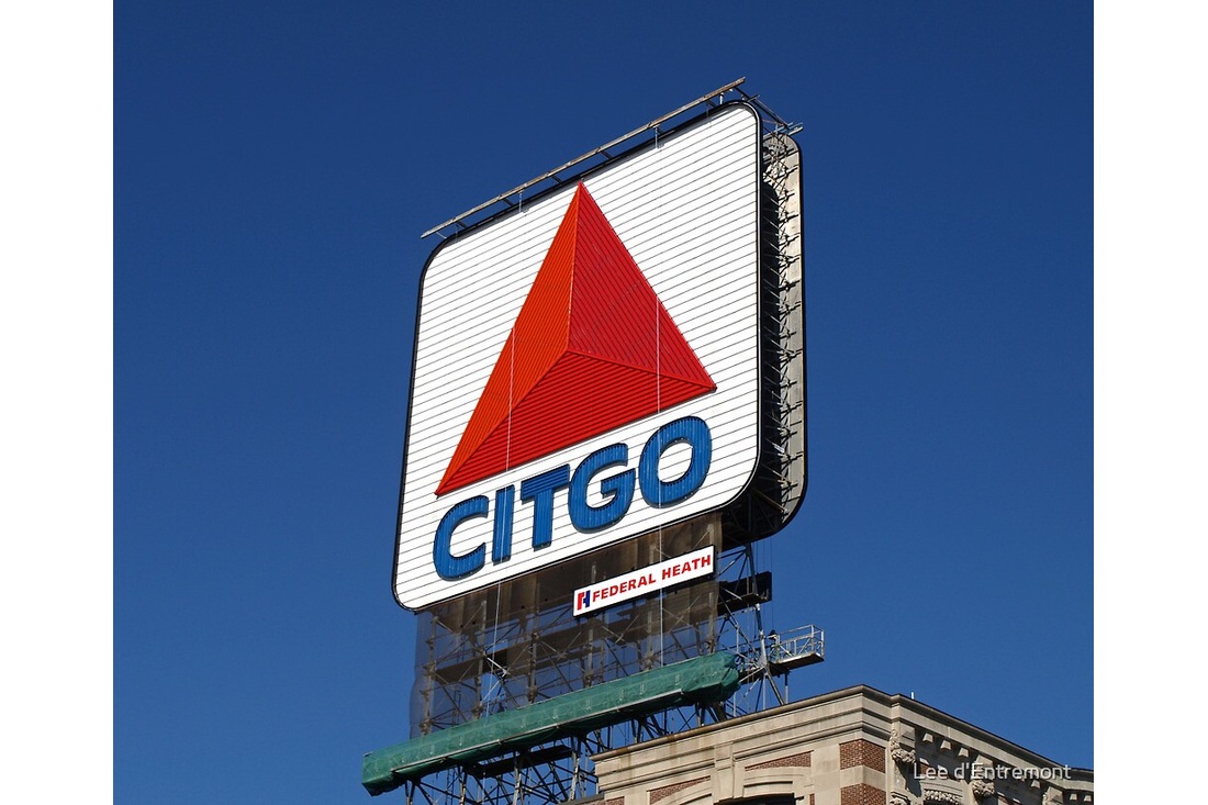 Boston’s rooftop CITGO sign with its red triangle and blue lettering against a clear sky.