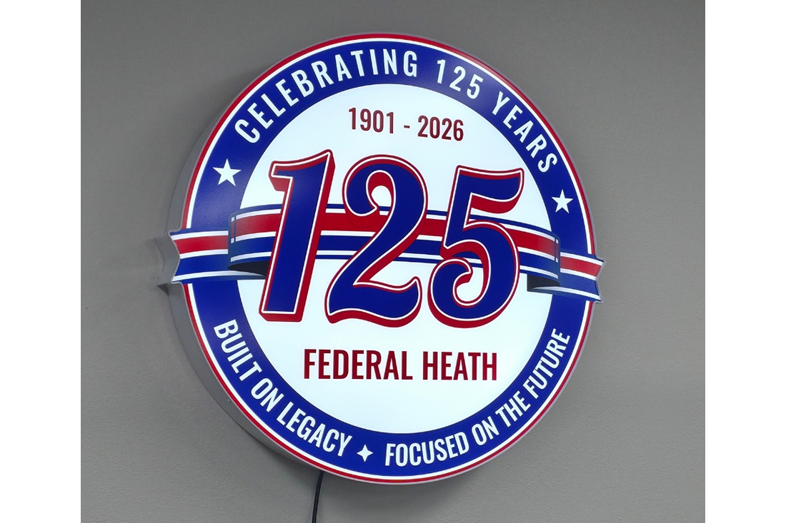 Illuminated Federal Heath 125th anniversary sign, 1901–2026, with the message “Built on Legacy. Focused on the Future.”