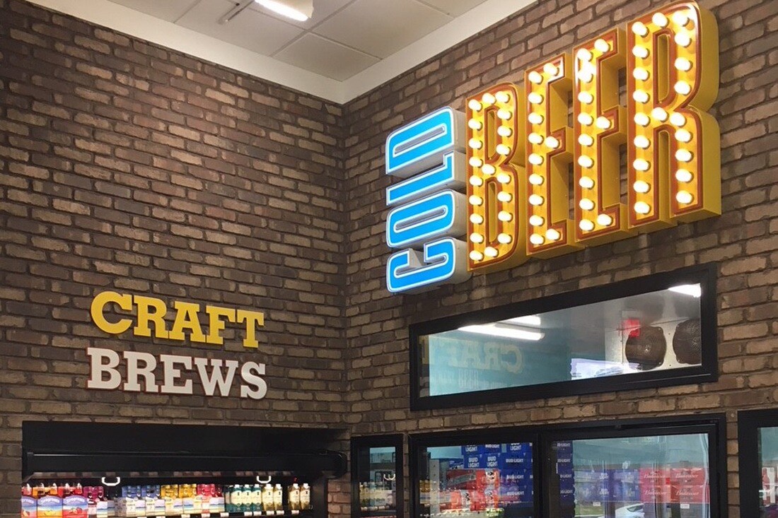 enmarket_petroleum_specialty-contracting_interior-signs-beer_1100x733