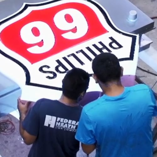 Shop photo of sign being produced