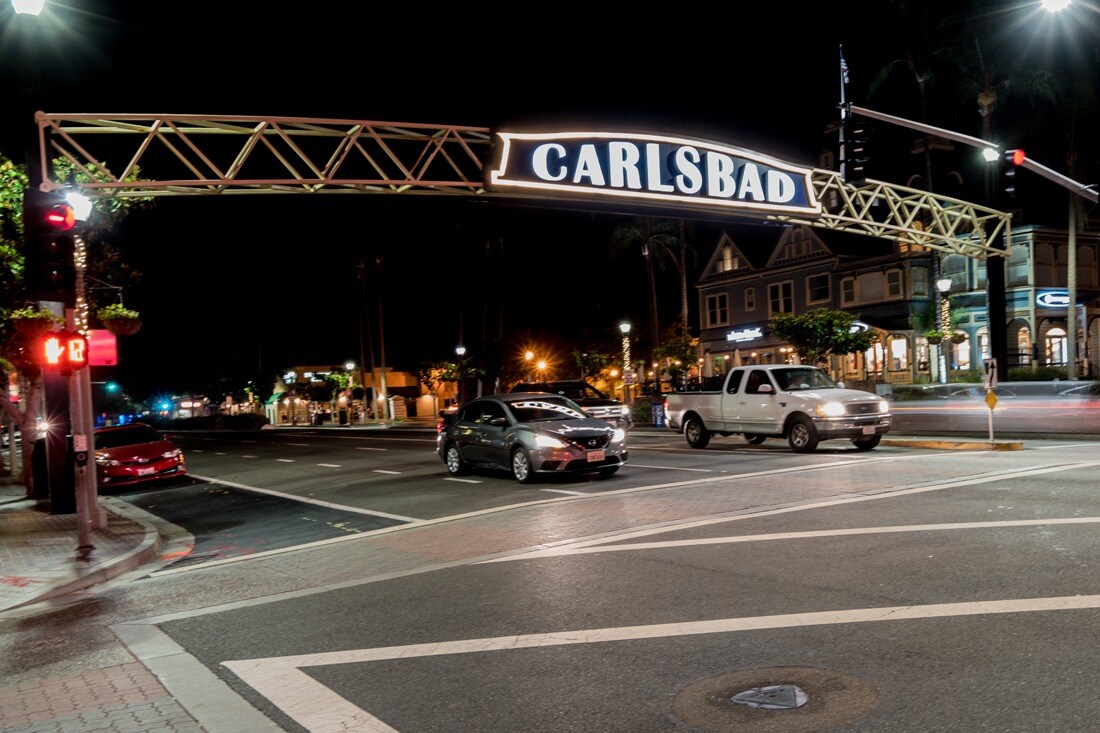 carlsbad-archway-sign_government_signage_sign-shot-from-street-at-night_1100x733