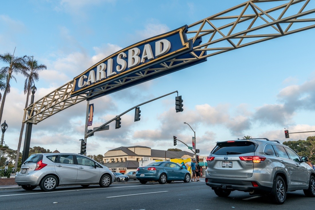 Carlsbad archway sign on flatbed truck