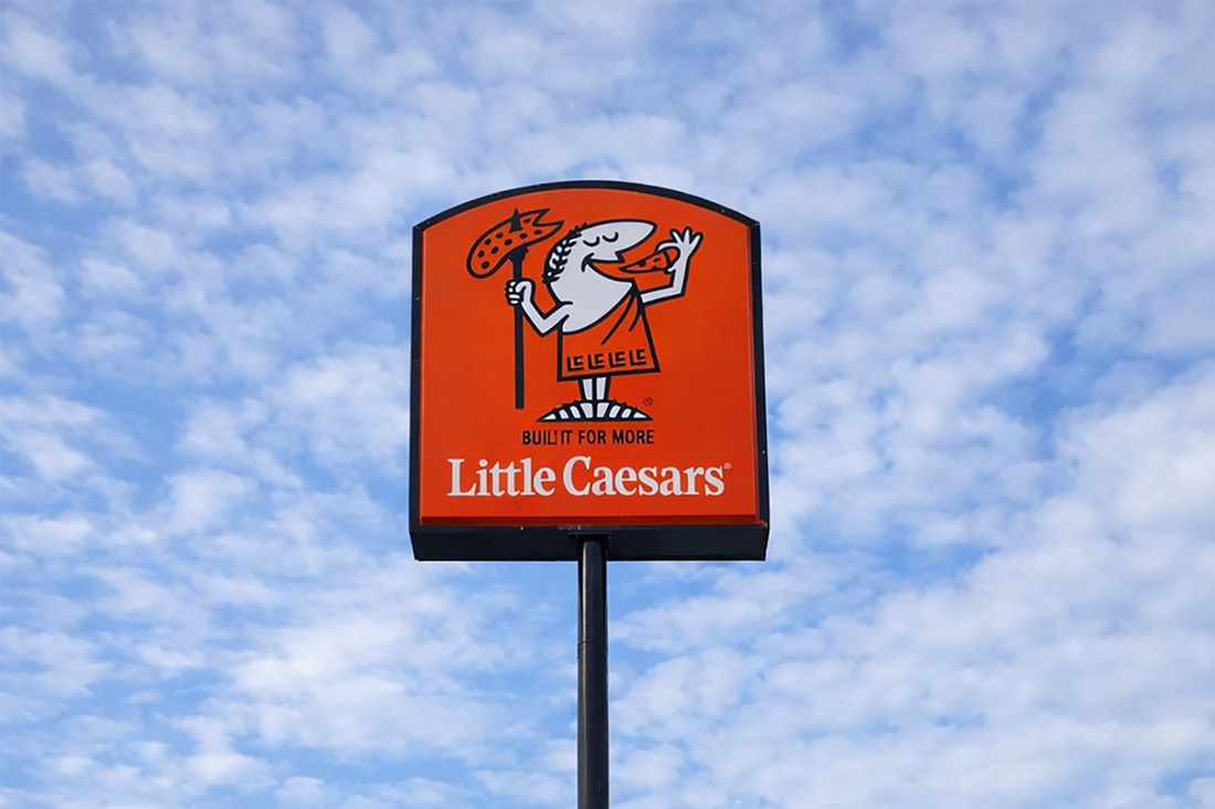 Little Caesars Pylon Sign with Blue Sky